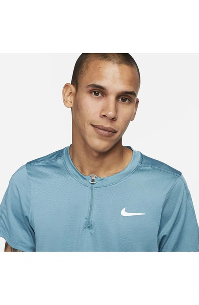 Shop Nike Court Dri-fit Advantage Tennis Half Zip Short Sleeve Top In Mineral Teal/ White