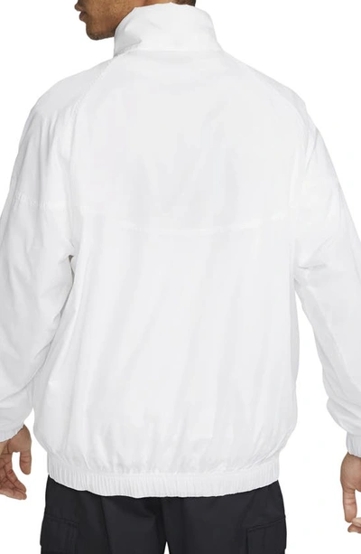 Shop Nike Water Repellent Half Zip Pullover In White/ Black