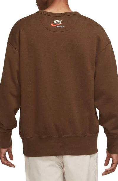 Shop Nike Sportswear Trend Oversize Graphic Crewneck Sweatshirt In Cacao Wow/ University Blue