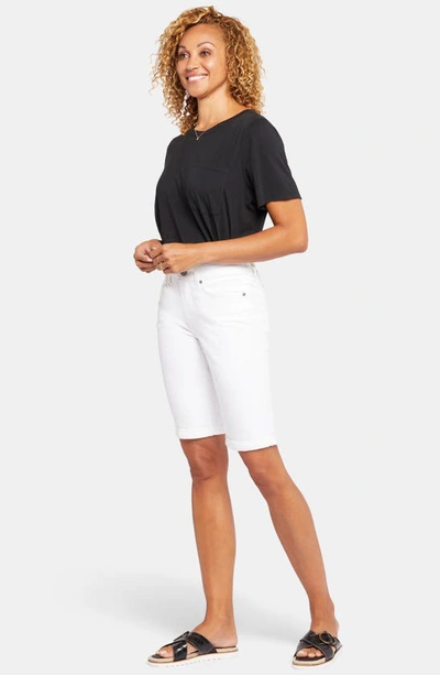 Shop Nydj Briella Roll Cuff Denim Bermuda Shorts In Optic White