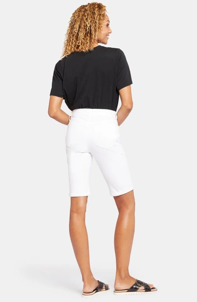 Shop Nydj Briella Roll Cuff Denim Bermuda Shorts In Optic White