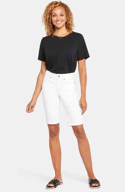 Shop Nydj Briella Roll Cuff Denim Bermuda Shorts In Optic White