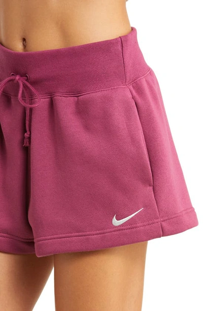 Shop Nike Phoenix Fleece Knit Shorts In Rosewood/ Sail
