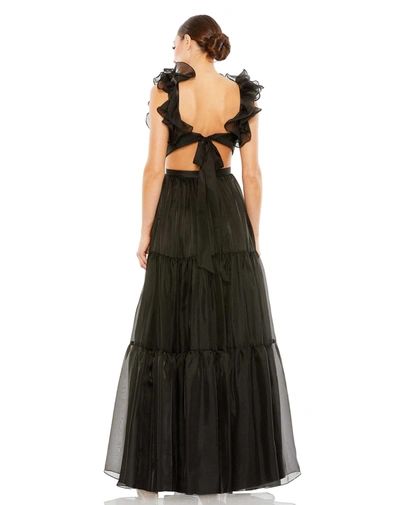 Shop Mac Duggal Ruffled Shoulder Cut Out Soft Tie Back Tiered Gown In Black