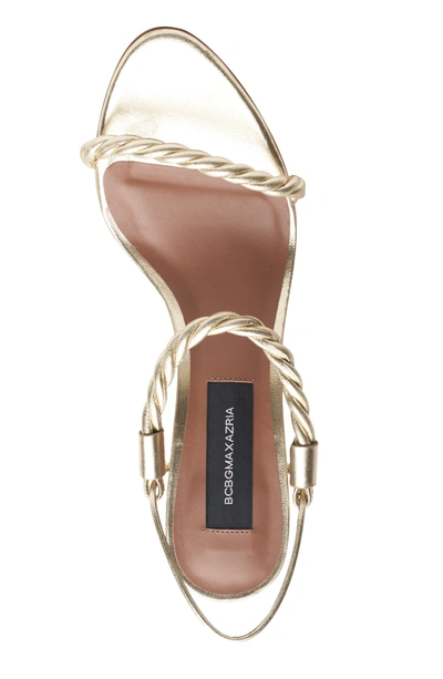 Shop Bcbgmaxazria Taylor Platino Leather Twist-strap Sandal Heel In Gold