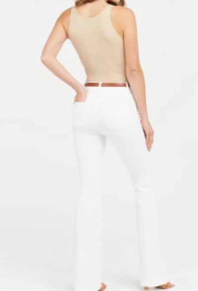 Shop Spanx Flare Jeans In White