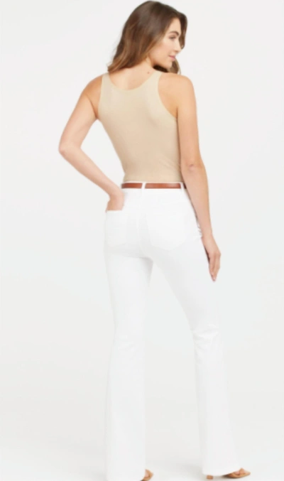 Shop Spanx Flare Jeans In White