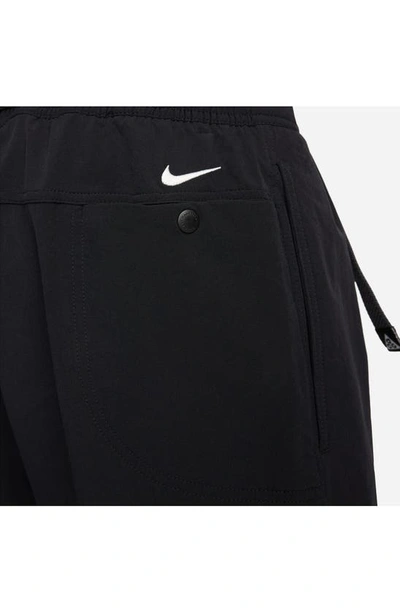 Shop Nike Acg Sunfarer Trail Pants In Black/ Summit White