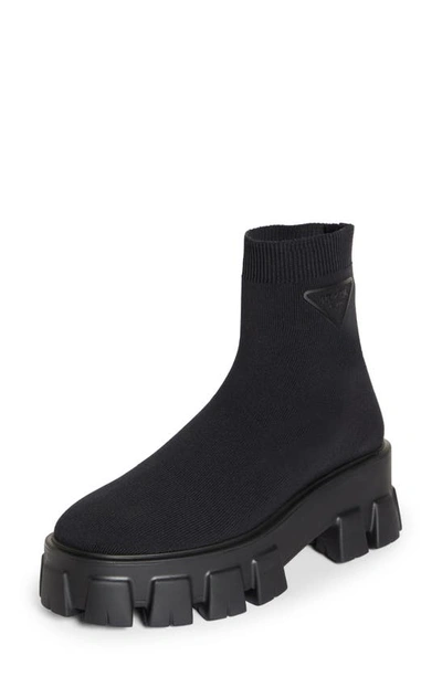 Shop Prada Monolith Lug Sole Sock Bootie In Nero