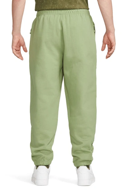 Shop Nike Solo Swoosh Fleece Sweatpants In Oil Green/ White