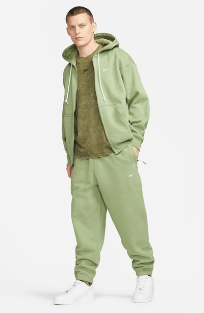 Shop Nike Solo Swoosh Fleece Sweatpants In Oil Green/ White