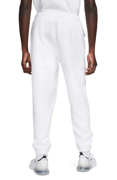 Shop Nike Solo Swoosh Fleece Sweatpants In White/ Black