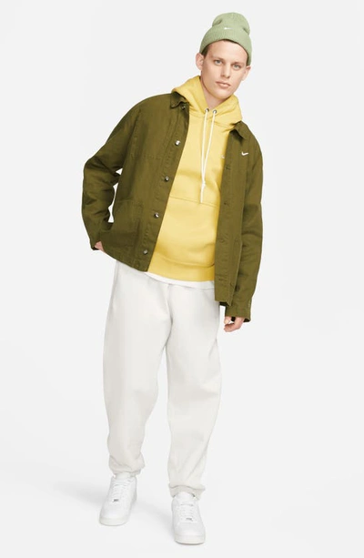 Shop Nike Solo Swoosh Fleece Hoodie In Saturn Gold/ White