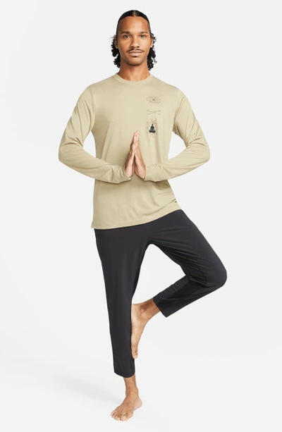 Shop Nike Flex Tapered Crop Yoga Pants In Black/ Black