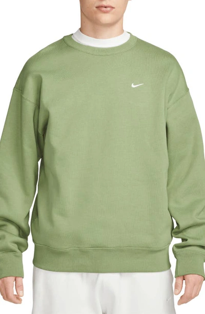 Shop Nike Solo Swoosh Oversize Crewneck Sweatshirt In Oil Green/ White