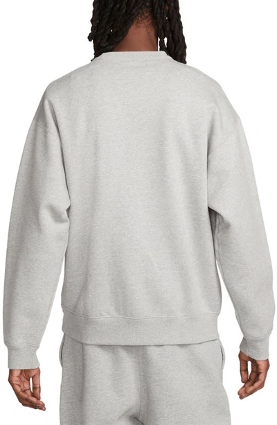 Shop Nike Solo Swoosh Oversize Crewneck Sweatshirt In Dark Grey Heather/ White