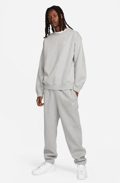 Shop Nike Solo Swoosh Oversize Crewneck Sweatshirt In Dark Grey Heather/ White