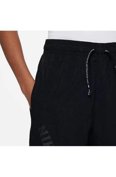 Shop Nike Kids' Athletics Repel Training Pants In Black/ Black/ White/ White