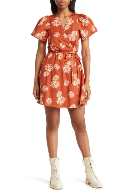 Shop Madewell Floral Print Wrap Minidress In Rusty Torch