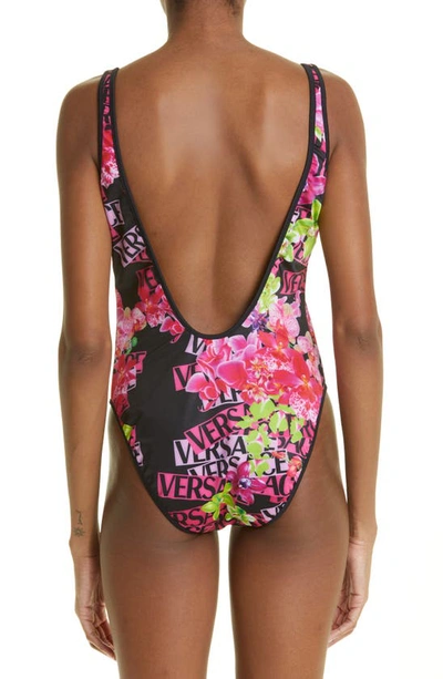 Shop Versace Orchid Print Reversible One-piece Swimsuit In Rosa