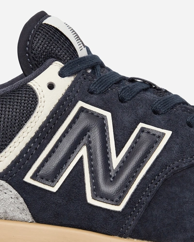 Shop New Balance 574 Sneakers In Blue