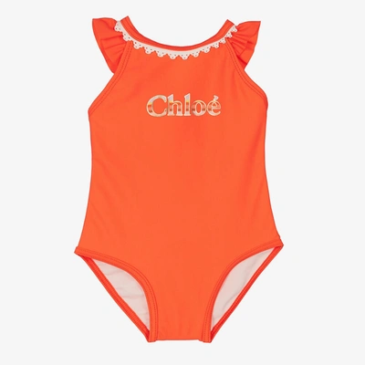 Shop Chloé Girls Coral Orange Logo Swimsuit