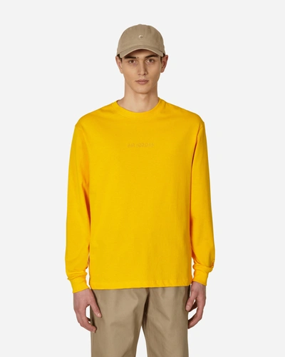 Shop Nike Wordmark Longsleeve T-shirt In Yellow