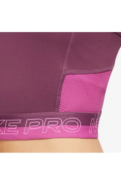 Shop Nike Pro Dri-fit Crop Tank In Rosewood/ Pinksicle