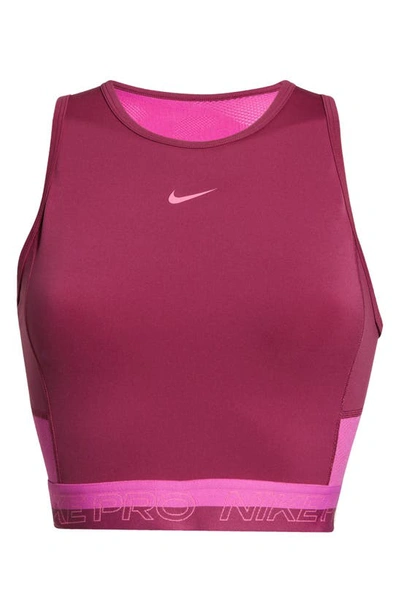 Shop Nike Pro Dri-fit Crop Tank In Rosewood/ Pinksicle