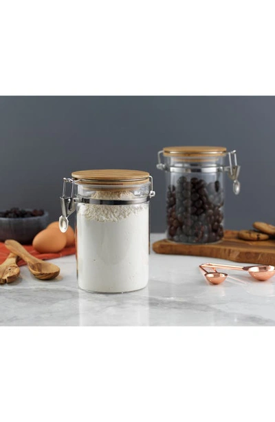 Shop Joyjolt Set Of 2 Glass Storage Jars With Airtight Bamboo Clamp Lids In Clear