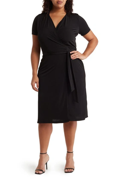 Shop Renee C Solid Jersey Wrap Dress In Black