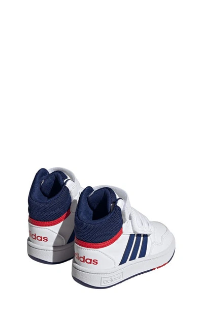 Shop Adidas Originals Kids' Hoops Mid Top Sneaker In White/ Victory Blue/ Scarlet