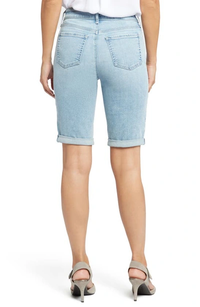 Shop Nydj Briella Roll Cuff Denim Bermuda Shorts In Promise