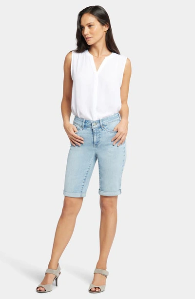 Shop Nydj Briella Roll Cuff Denim Bermuda Shorts In Promise