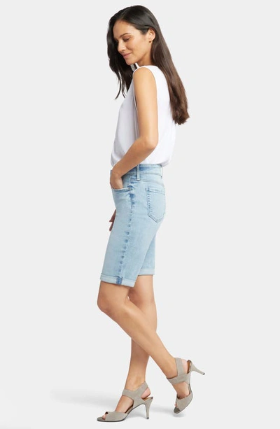 Shop Nydj Briella Roll Cuff Denim Bermuda Shorts In Promise