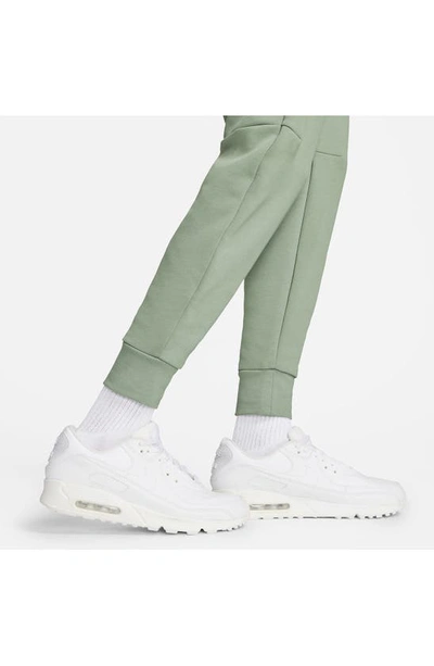 Shop Nike Tech Fleece Jogger Sweatpants In Mica Green/ Black