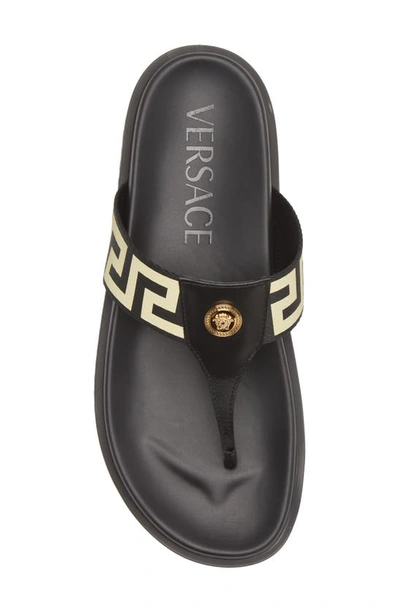 Shop Versace Greca Flip Flop In Black  Gold