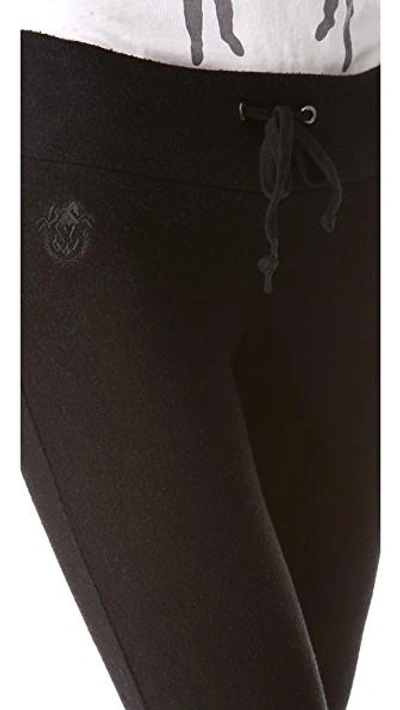 Shop Wildfox Basic Flare Sweatpants In Jet Black