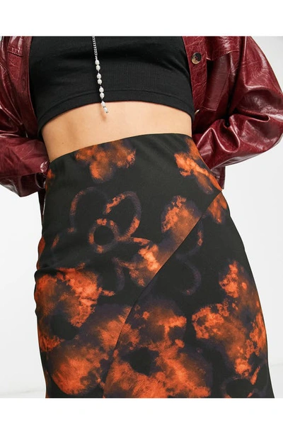 Shop Asos Design Abstract Floral Midi Skirt In Black