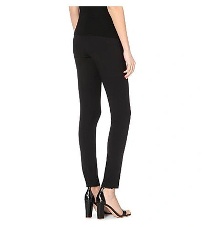 Shop Theory Skinny Jersey Trousers In Black
