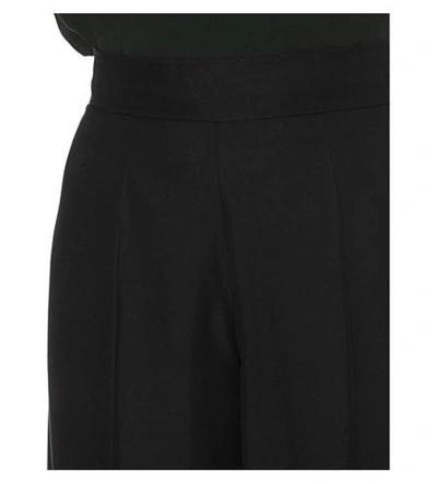 Shop Valentino Wide High-rise Silk Trousers In Black