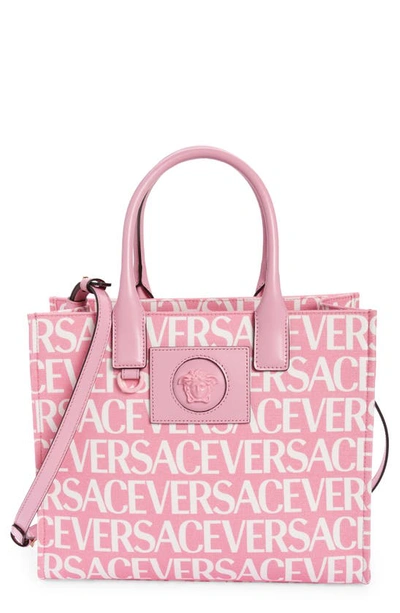 Shop Versace Small La Medusa Canvas Tote In Baby Pink/ White/  Gold