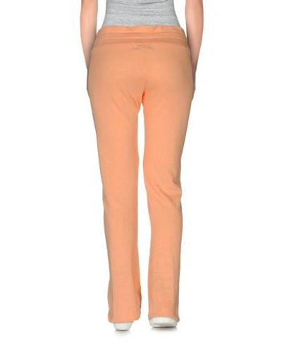 Shop Wildfox Casual Pants In Apricot