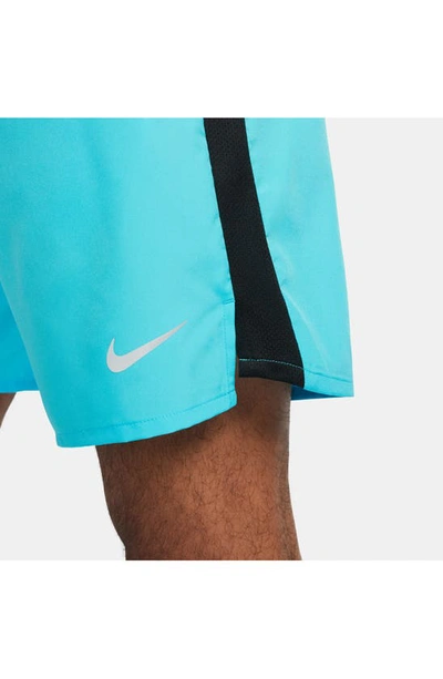 Shop Nike Dri-fit Challenger Athletic Shorts In Blue/ Black/ Reflective Silv