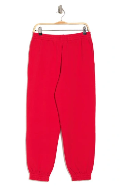 Shop Mcq By Alexander Mcqueen Regular Fit Metal Logo Sweatpants In Riot Red