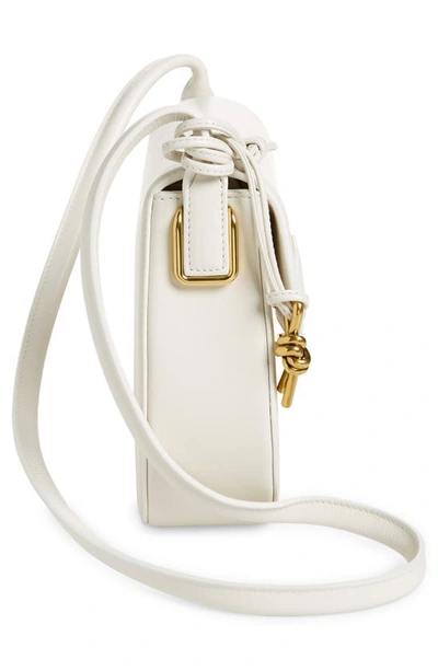 Shop Bottega Veneta Desiree Leather Crossbody Bag In 9104 Chalk-m Brass