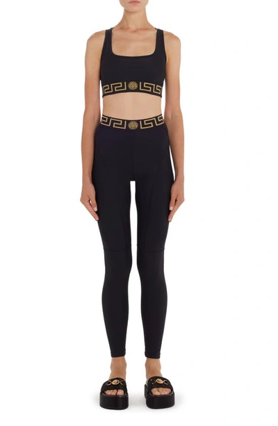 Shop Versace La Greca Waistband Leggings In Nero