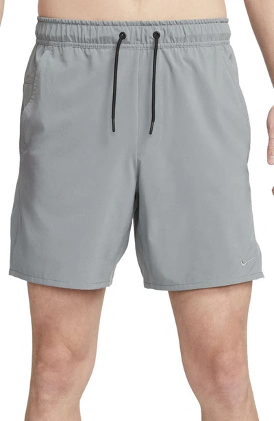 Shop Nike Dri-fit Unlimited 7-inch Unlined Athletic Shorts In Smoke Grey/ Black/ Smoke Grey