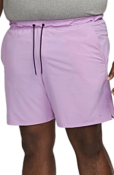 Shop Nike Dri-fit Unlimited 7-inch Unlined Athletic Shorts In Rush Fuchsia/ Black