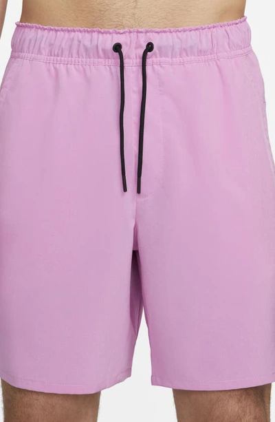 Shop Nike Dri-fit Unlimited 7-inch Unlined Athletic Shorts In Rush Fuchsia/ Black